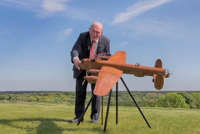 George 'Johnny' Johnson with the replica piece