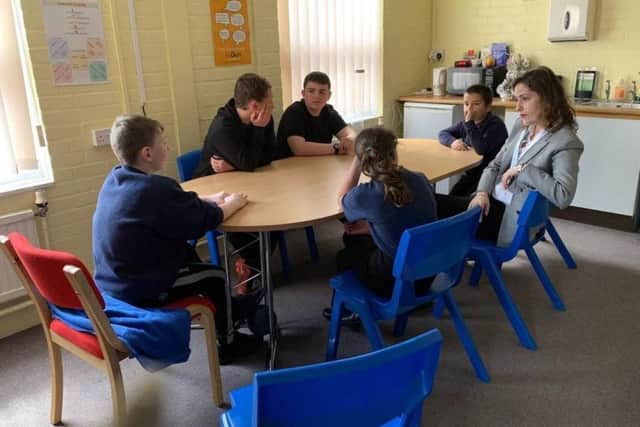 MP Victoria Atkins sits in on a school parliament meeting.