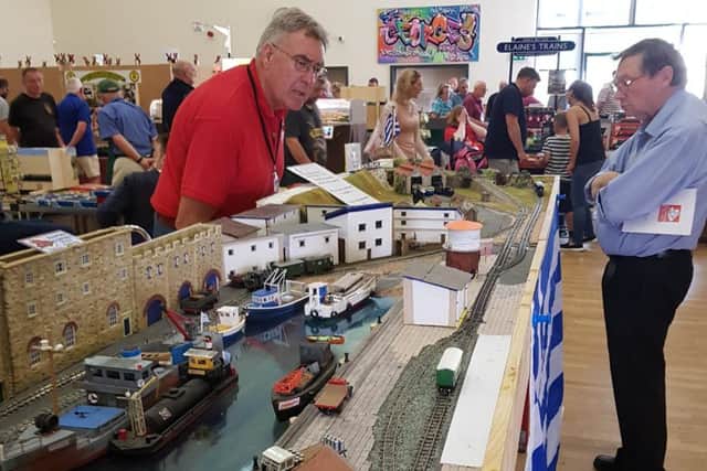 Mark Bamford of Sleaford Model Railway Club displaying one of the club's layouts. EMN-190306-235527001