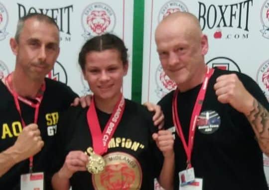 Angelica Finch celebrates winning the East Midlands Box Cup.