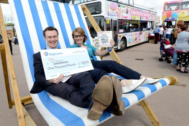 Celebrating the return of the Seasiders family of buses. Matt Cranwell, managing director of Stagecoach East Midlands and Louise O'Reilly from Active Lincolnshire.