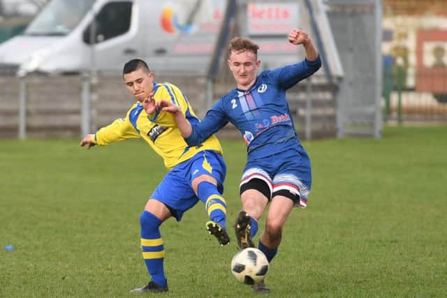 Fosdyke Reserves (blue) will not compete in the Boston Saturday League next season.