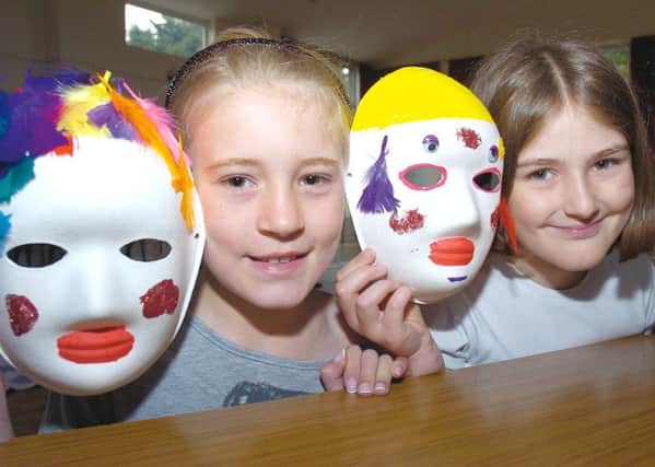Mask making& pictured, from left, Eleanor Houghton, 10, and Emily Reeson, nine.