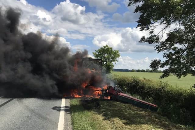 The blazing tractor on the A17 near Brant Broughton on Thursday afternoon. Photo: British Transport Police Lincolnshire. EMN-190706-175706001