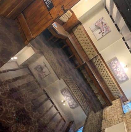 The flooded dining room at the Red Lion in Newton on Tuesday. Photo: Le-Anne Askew EMN-190613-115244001