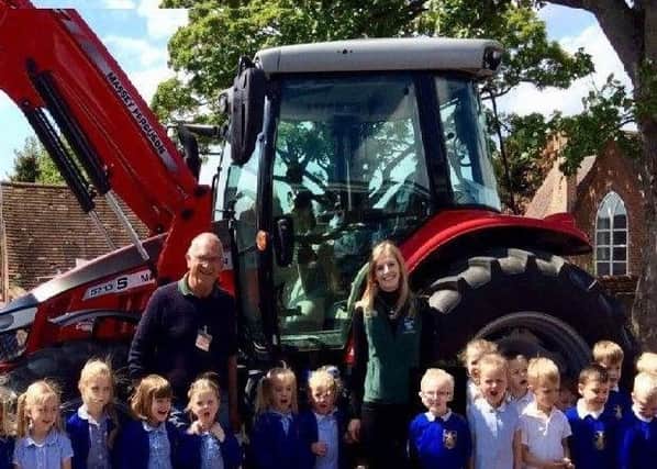 Malcolm Vaughan and Victoria Colebrook from Sir Richard Sutton Limited, Stainton Le Vale visited Caistor Primary School to help the youngest children learn where their food comes from EMN-190613-125513001