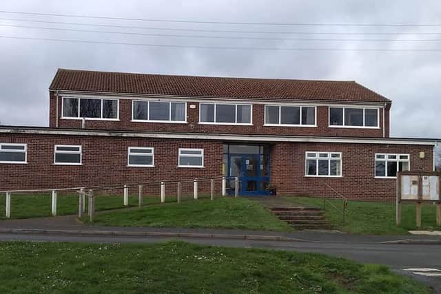 Wilsford village hall - the flat roof section at the front needs £7,000 worth of urgent repairs after heavy rains caused it to leak. EMN-190613-174419001