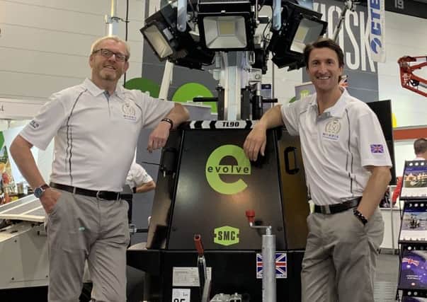 Phil Winnington, international business director, and Chris Morris, chief executive, with the SMC TL90 Evolve, in Melbourne.
