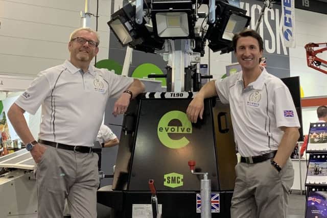 Phil Winnington, international business director, and Chris Morris, chief executive, with the SMC TL90 Evolve, in Melbourne.