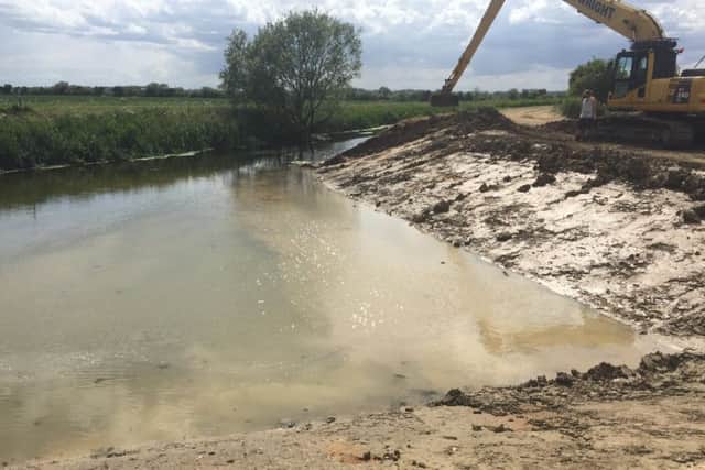 A crane carries out work at Sleaford Navigation.