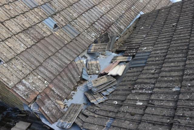 The damage left by lead thieves on the roof of the Methodist church rooms. EMN-190618-104713001
