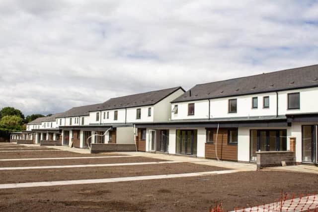 Some of the refurbished homes on Newfield Road. EMN-190618-174220001