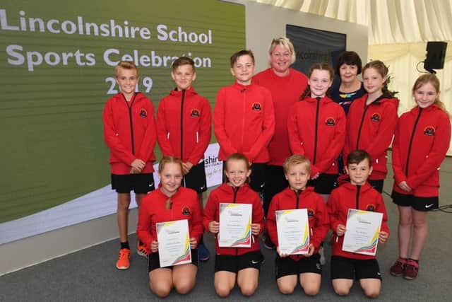 Leasingham St Andrews School netball team, presented with an award by Lincolnshire County Council, pictured with Sally Blythe - school coach, and Councilllor Patricia Bradwell - deputy leader of LCC. EMN-190620-091133001