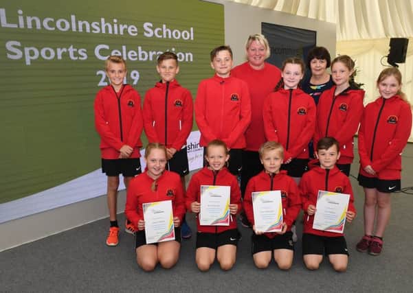 Leasingham St Andrews School netball team, presented with an award by Lincolnshire County Council, pictured with Sally Blythe - school coach, and Councilllor Patricia Bradwell - deputy leader of LCC. EMN-190620-091133001