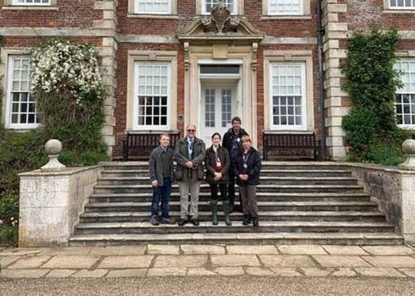 MP Victoria Atkins meets the National Trust team responsible for conservation and maintenance at Gunby Hall. EMN-190619-123309001