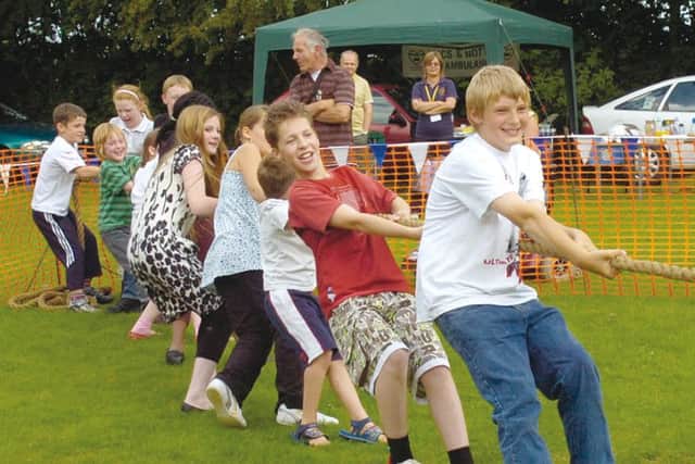 Tug of war at New Leake Primary SchooL's Summer Fair 10 years ago.