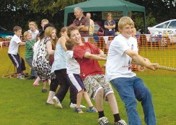 Tug of war at New Leake Primary SchooL's Summer Fair 10 years ago.