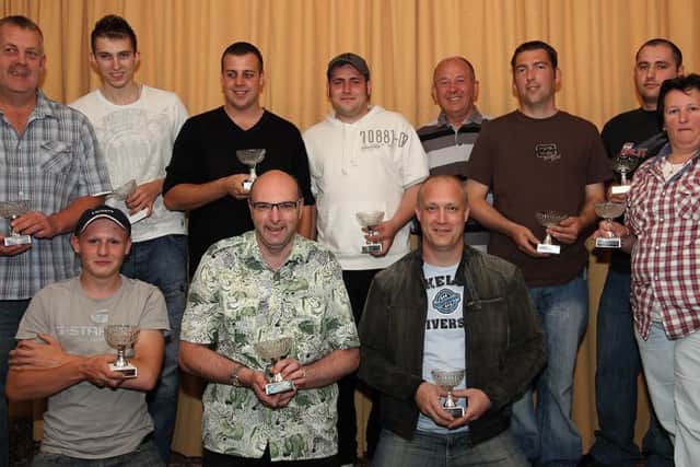 Pictured (from left, back) Alan Beardsley, Joe Hunt, Chris Allen, Anthony Newey, Doug Buck, Mark Forman, Matt Northwood and Debbie Pullen, (kneeling) Bevin Walker, John Meads and Richard Haigh.