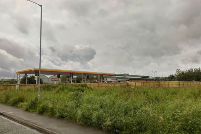 The land next to the Shell garage has been sold to an investment company.