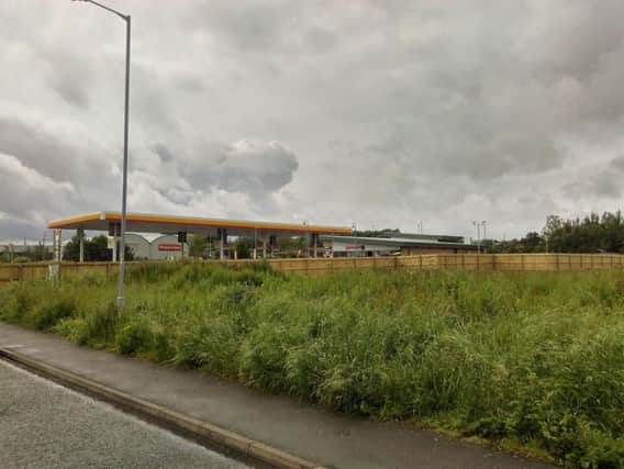 The land next to the Shell garage has been sold to an investment company.