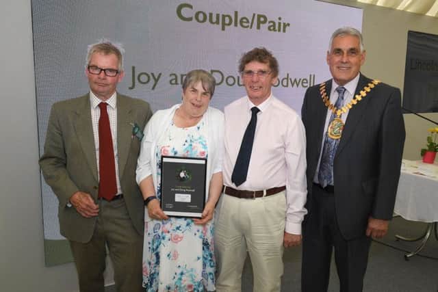 Lincolnshire County Council awards, presented by leader of LCC Martin Hill (left) and chairman of LCC Tony Bridges (right). Couple of the Year is Joy and Doug Rodwell, of Hemingby.