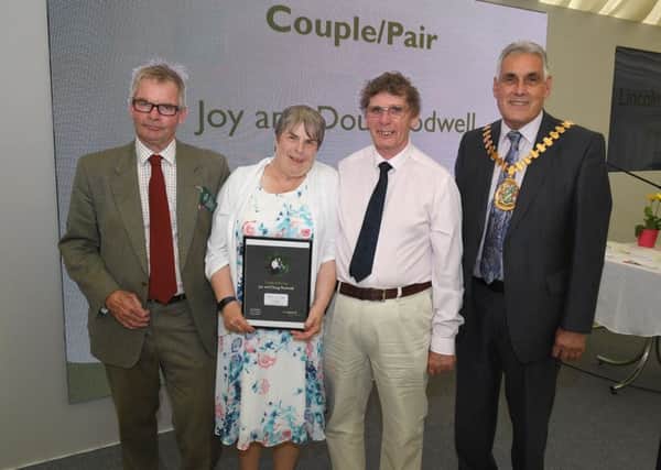 Lincolnshire County Council awards, presented by leader of LCC Martin Hill (left) and chairman of LCC Tony Bridges (right). Couple of the Year is Joy and Doug Rodwell, of Hemingby.