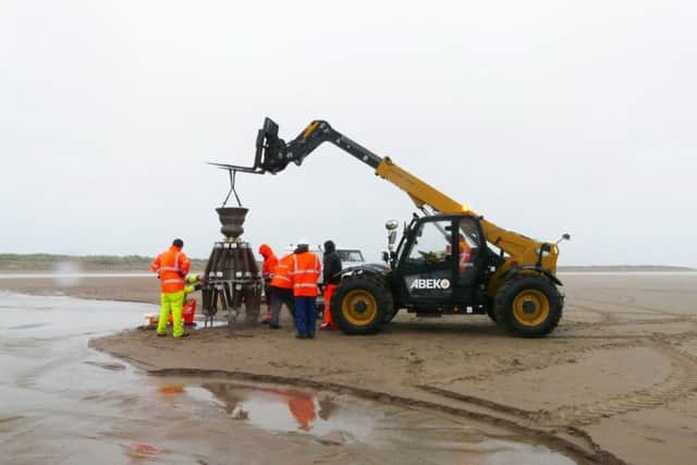 Installation of the Time and Tide Bell at Mablethorpe.
