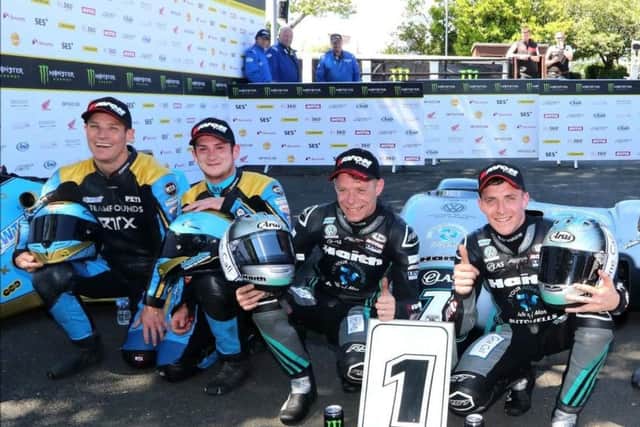 Pete Founds and Jev Walmsley (left) on the TT podium after race two EMN-190620-135328002