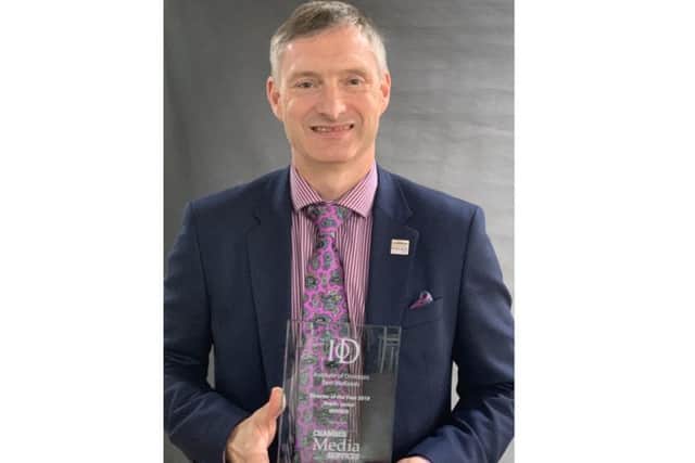 Chief Constable of Lincolnshire Bill Skelly with his director's award. EMN-190621-102533001