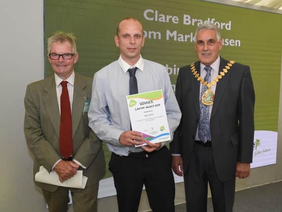 Lincolnshire Show. Lincolnshire County Council, Inspirational Learners awards, presented by leader of LCC Martin Hill (left) and chairman of LCC Tony Bridges (right). Robin Aldrich of Boston