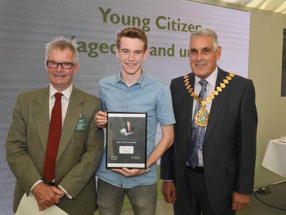 Lincolnshire County Council awards, presented by leader of LCC Martin Hill (left) and chairman of LCC Tony Bridges (right) to Young Citizen of the Year, Jack Covill-Lowndes of Wainfleet.