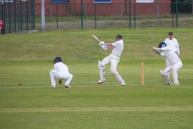 Market Rasen CC batsman Neil Davies hits through the Caistor infield. PICTURE: Peter Thompson EMN-190624-101318002