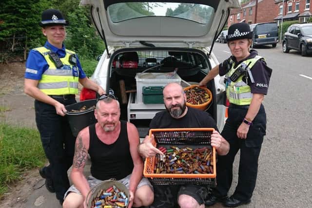 Wayne Burley and Ben Sharpe pictured with PCSO Blachut, left, and PC Young, from Wolds Policing Team, with the haul of shotgun annunition.