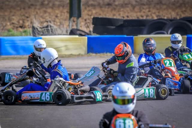 Carltons Michael Kenney (48) and Bostons Reece Cridland (46) come together in a first corner pile-up at the March meeting. Picture: Paul Denton EMN-190625-090220002