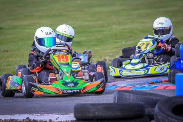 Cadwells Liam Hartey (19) and Somercotes driver Alfie Larder (21) will hope to take the spoils in Cadets. Picture: Paul Denton EMN-190625-090232002