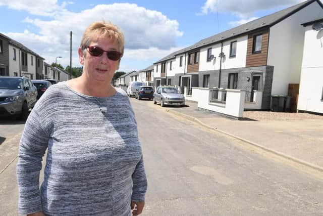 Former tenant Pat Cross is amazed at the transformation of her old home.