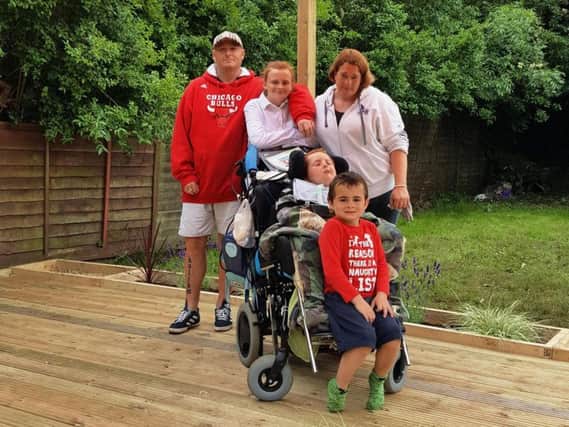 Kallum and his family's first visit to their new accessible garden.