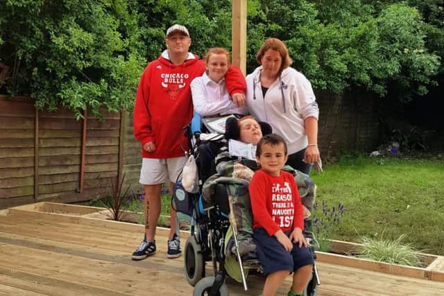 Kallum and his family's first visit to their new accessible garden.