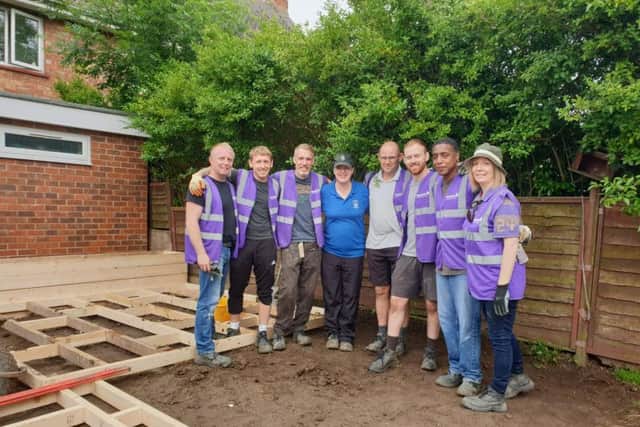 The team prepare to start constructing the accessible garden.