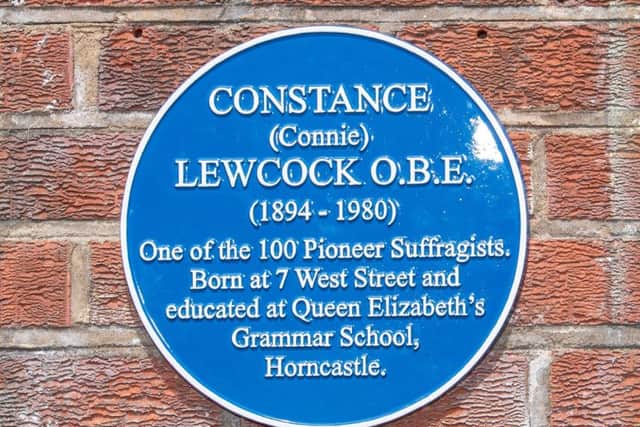 A close up of the blue plaque at QEGS. EMN-190107-144414001