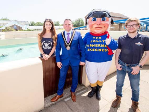 Mayor of Skegness Coun Mark Dannatt with the Jolly Fisherman and Daisy and Matt Yeadon.