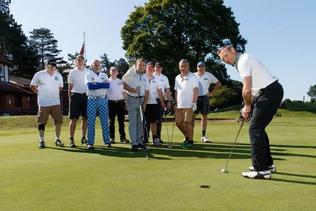 Golfers from RAF Stations around Lincolnshire joined forces to raise funds for MacMillan Cancer support, playing for 24 hours at Sleaford Golf Club and completing four full rounds of 18 holes in the 24 hours. Photo: Paul Saxby. MoD EMN-190207-115517001