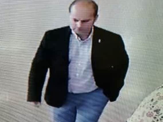 CCTV image of a man police would like to speak to.
