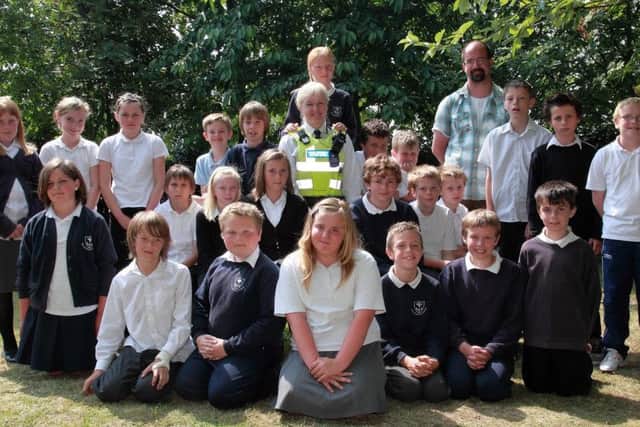 Children at Wainfleets Magdalen Primary School with PCSO Jayne Richardson.