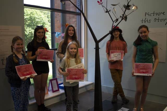 Illustrated story competition winners, pictured from left - Hanna Powell, Emily Allen, Ciara OBeirne, Oskar McIntosh and Eleanor Woolner. Front: Eli McGee. EMN-190807-172956001