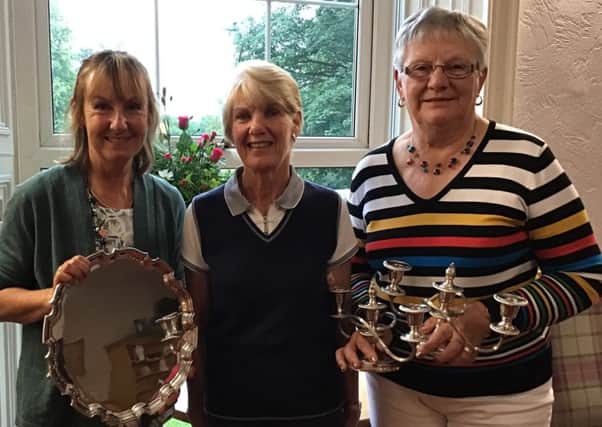 Louth GC's ladies' champion Pam Shepherd (right) with Heath Trophy winner Elaine Blyth (left) and lady captain Janet Ablott EMN-190407-141409002