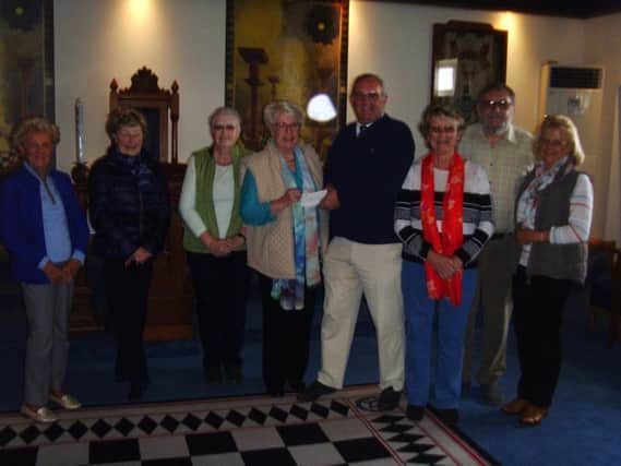 Cheque presentation of 500 from Lumley Chapter 1893 to The League of Friends of Skegness Hospital. Pictured (from left) are Eleanor Cole, Sheila Bryan, June Clingan, Bess Smith (Chairman), Bob Hoffman, Gill Muirhead, Rob Watson and Rosemary Robinson..