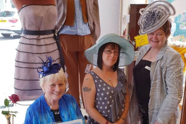 Theyve got their hats sorted! Age UK Lindsey shop manager DianeCresswell, right, with volunteers Jo Gregory and Ann Otter. EMN-190707-215703001