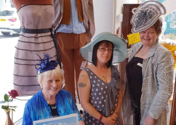 Theyve got their hats sorted! Age UK Lindsey shop manager Diane
Cresswell, right, with volunteers Jo Gregory and Ann Otter. EMN-190707-215703001