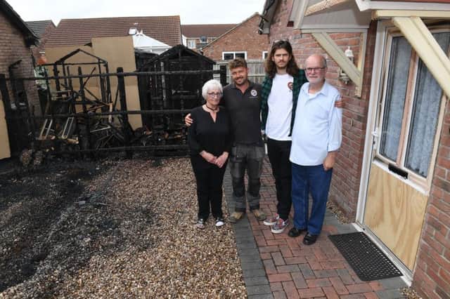 Fire heroes have been paised after fire engulfed front of homes in Skegness. Pictured from left are Gloria Nettle, Ricky Otter,
